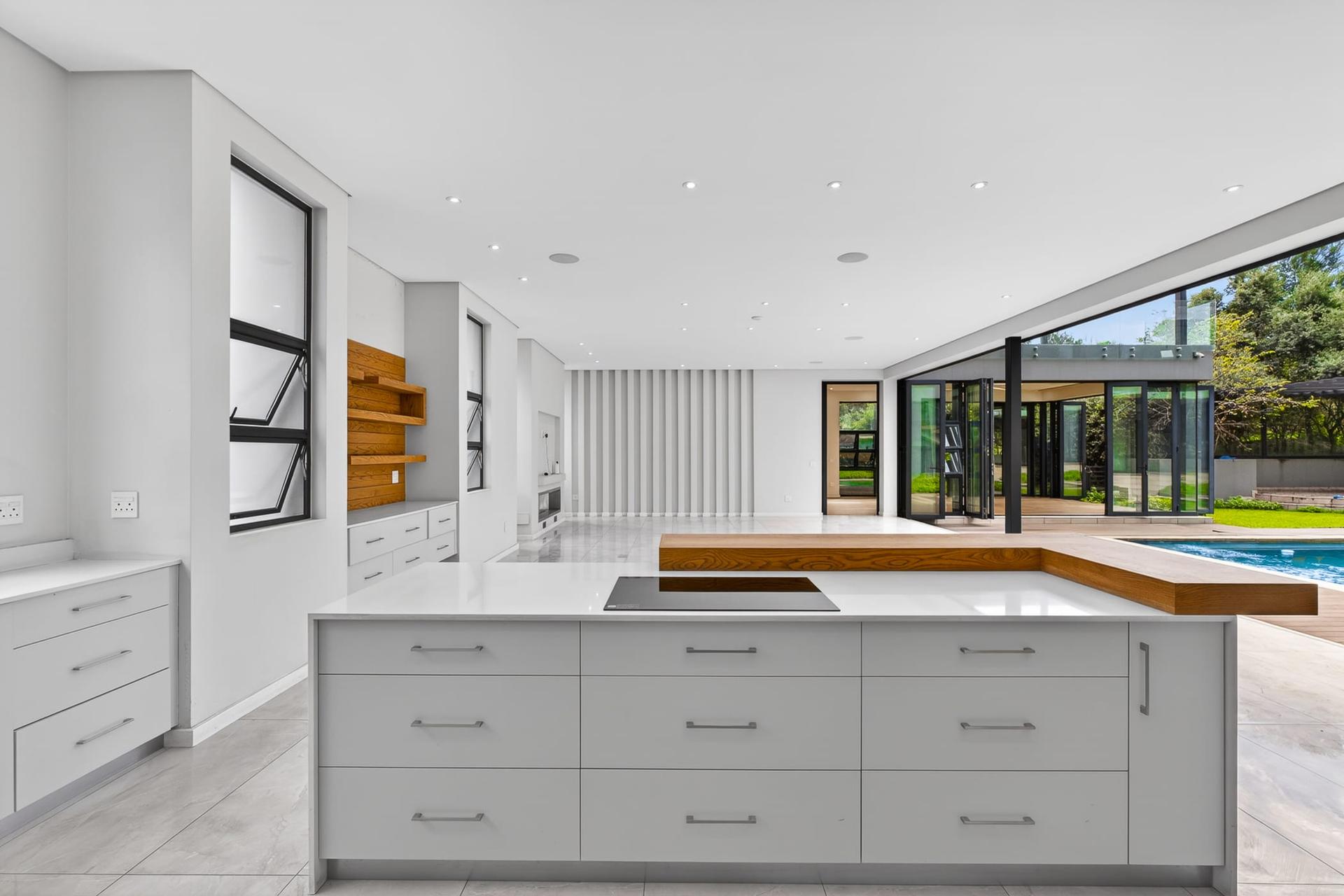 Architectural Triple-Storey Residence with Private Greenbelt Views — photograph 4